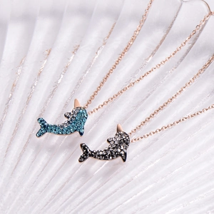 Elegant dolphin pendant necklace with blue and grey crystals in rose gold finish
