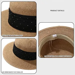 Flat top straw hat with black rhinestone ribbon and wide brim for summer sun protection