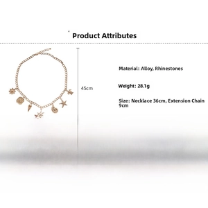 Detailed view of bohemian gold ocean necklace with starfish, turtle and shell charms