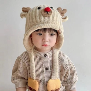 Winter knit baby hat with cute reindeer design and fleece lining for warmth
