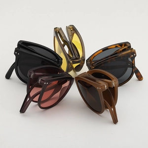 Top view of compact foldable oval sunglasses in multiple colors for easy storage