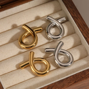 Minimalist twisted geometric fish-shaped stainless steel stud earrings in gold and silver