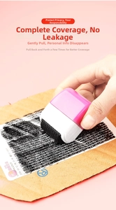Pink privacy protection roller stamp masking personal address details on package