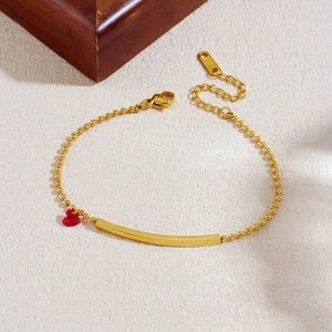 Elegant gold-plated stainless steel ball chain bracelet with a red heart crystal pendant