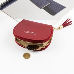 Red shell-shaped PU leather coin purse with tassel zipper and Forever Young logo