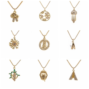 Set of 9 elegant gold-plated fan-shaped tassel pendants with cubic zirconia inlay