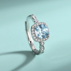 S925 silver halo ring with large square blue gemstone and fine sparkling side diamonds