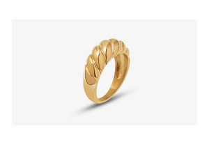 Detail of vintage 18k gold plated titanium steel croissant ring with wavy texture
