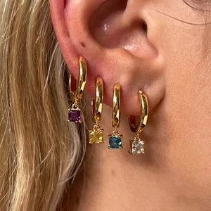 Set of 4 gold plated titanium earrings featuring colorful square zircon pendant charms