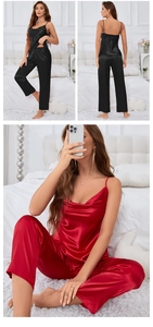 Detail of silk satin pajamas showing adjustable spaghetti straps and black fabric texture
