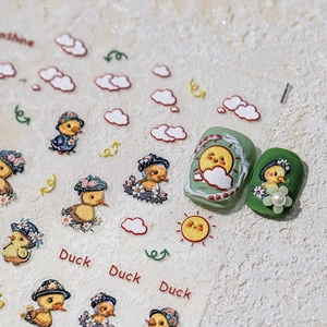 3D nail art stickers featuring elegant yellow duck patterns and sunshine motifs