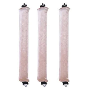 Detailed view of three velvet heatless hair curlers with champagne finish and hooks