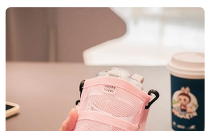 Pink mesh water bottle carrier with adjustable shoulder strap for kids portable use