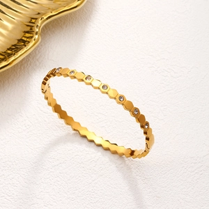 Luxury 18K gold plated honeycomb bangle with geometric hexagon design and zircon inlay
