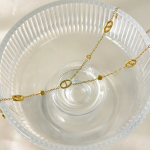Classic 18K gold plated titanium steel necklace with chic pig nose tassel design for women