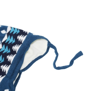 Detail of baby winter knit hat with soft white fleece lining and blue tree pattern