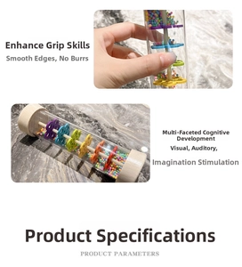 Macro detail of wooden rainmaker baby toy with colorful beads for sensory development