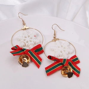 Festive Christmas earrings featuring white snowflake charms and red-green bow with gold bell