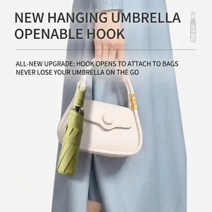 Green tri-fold automatic umbrella with U-shaped hook handle for easy bag attachment