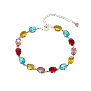 Sparkling silver bracelet with colorful oval crystals in red, blue, yellow and pink