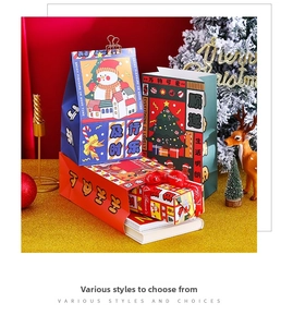 Detailed view of Christmas gift bags and boxes set with snowman and reindeer patterns