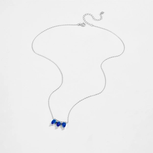 Close-up of S925 sterling silver hallmark on teardrop crown necklace chain