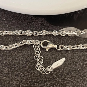 S925 sterling silver geometric twisted chain bracelet with secure lobster clasp closure
