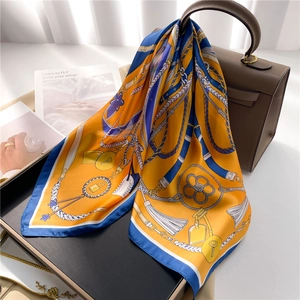 Silk-feel fashion scarf with equestrian chain print and orange-blue contrast colors
