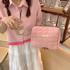 Pink heart quilted cosmetic bag with top zipper and stylish letter logo for women
