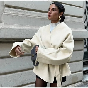 Women's cream white V-neck wool jacket with matching waist belt and loose-fit drop shoulders