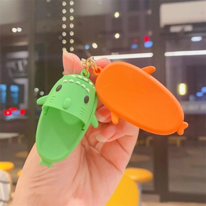 Creative mini shark slipper keychains in green and orange silicone on a metal ring
