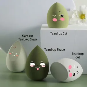4-piece makeup sponge set with teardrop and angled shapes in gradient green and white