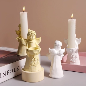 Elegant angel girl resin candlestick mold showing white and beige floral relief statues
