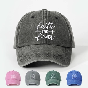 Close-up of Faith Over Fear washed cotton baseball caps in multiple vintage colors