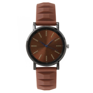 Minimalist quartz watch with brown 3D geometric silicone strap and blue analog hands