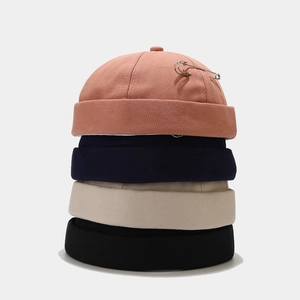 Docker hat set for men and women featuring a unique silver metal pin and four solid colors