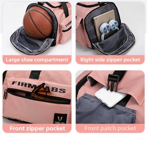 Pink fitness bag detail showing shoe compartment, side zipper pockets, and large capacity