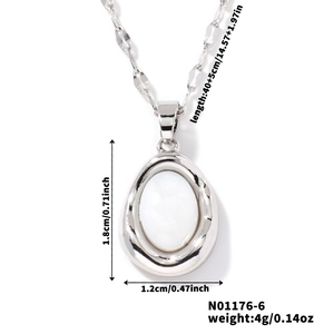Macro detail of oval pendant with silver finish including exact size and weight specs