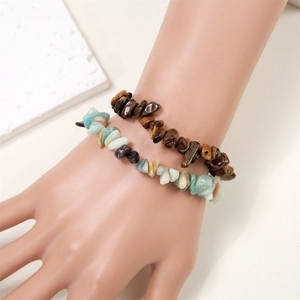 Detailed shot of double-layer natural tiger eye and mixed gemstone bead bracelets
