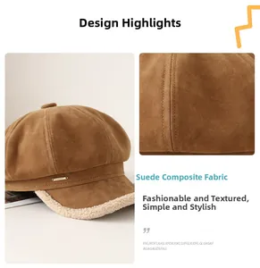 Detail of brown faux suede baker boy hat featuring warm fleece trim and metal logo tag