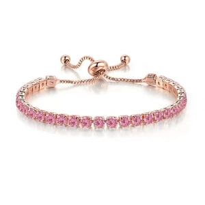 Detail of rose gold tennis bracelet with pink crystals and adjustable bolo clasp