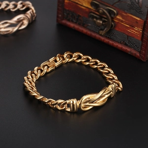 Hip hop style 18K gold plated stainless steel Cuban chain bracelet with knot design