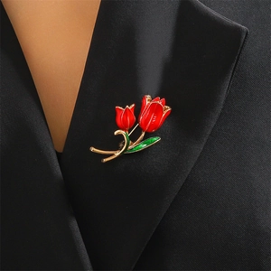 Elegant red tulip flower brooch pin with green leaves on black suit lapel