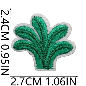 Detailed view of green palm leaf embroidery patch with size markers 2.4cm x 2.7cm