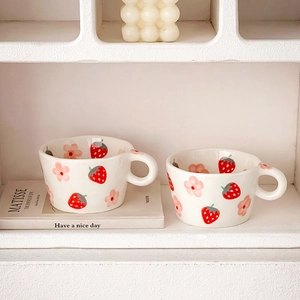 Set of two cute strawberry and flower hand-painted white ceramic breakfast mugs