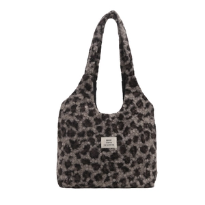 Winter faux fur leopard print tote bag with soft plush texture and wide shoulder strap
