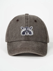 Detailed embroidery of a raccoon on a washed charcoal grey vintage cotton baseball cap