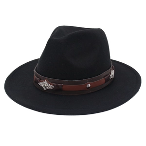 Detail of wide brim fedora hat featuring brown leather band and western silver buckle