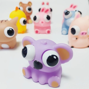 Purple koala squeeze toy with pop-out eyes for stress relief and sensory fun