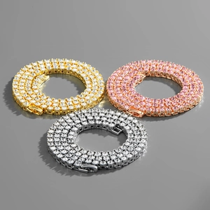 Three rows of triple tennis chains in gold, rose gold and silver finish with rhinestones